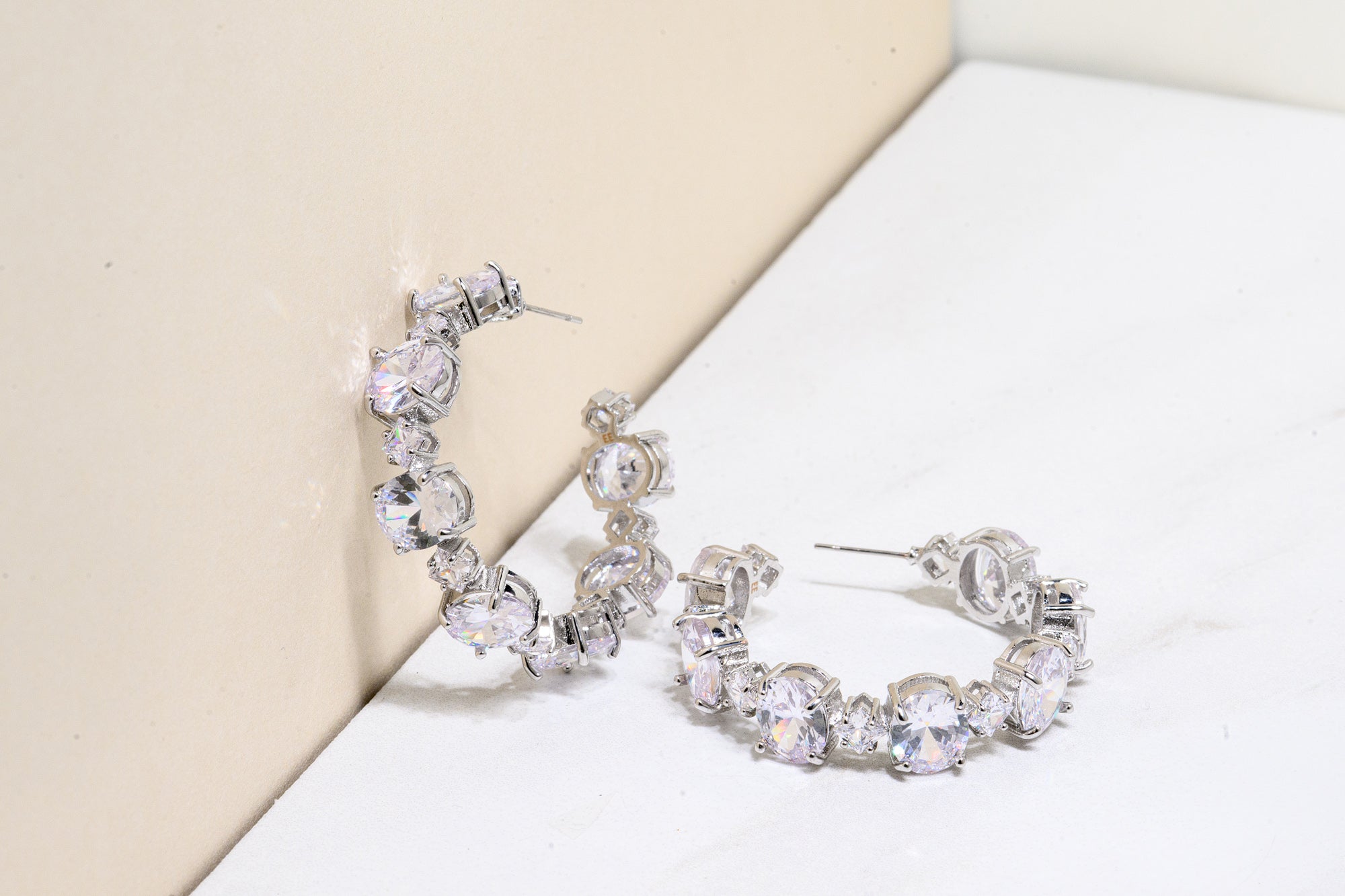 Large diamond hoop cubic zirconia earrings
