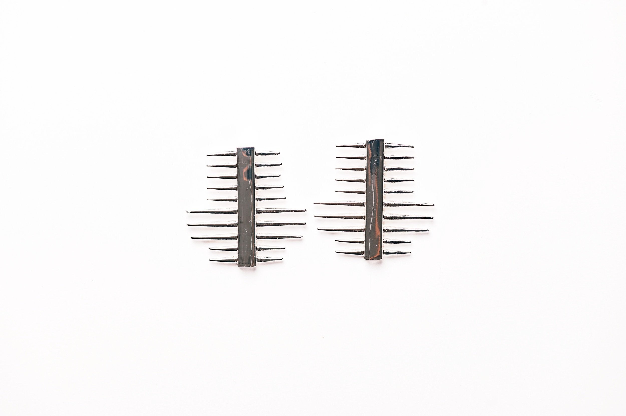 Revolt Spiked Drop Silver Statement Earrings